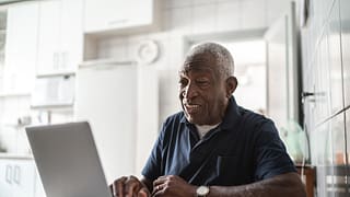 senior man laptop gettyimages