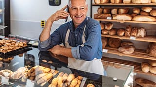 senior man working in bakery gettyimages