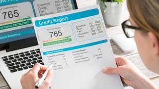 PersonLookingUpCreditScore.width .jpg
