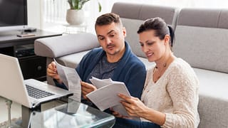 couple organizing paperwork.width