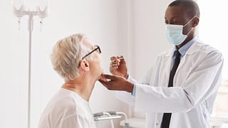 doctor treating patient