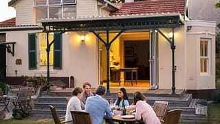 family eating at backyard table XzvkkVn.width