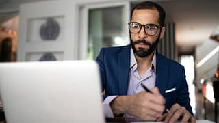 investor studying laptop