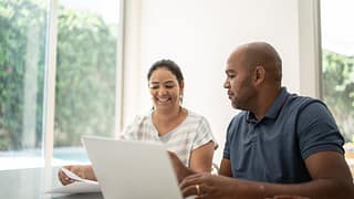 mature couple doing taxes FlzKDuS.width