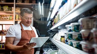 older man food counter ettyimages
