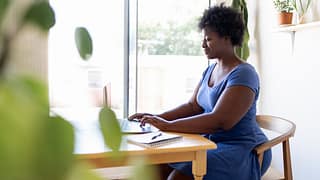 person working at home on laptop eHAgcI.width