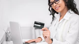 smiling woman with credit card.width .jpg