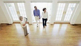 two people with realtor in house EOhMdBw.width
