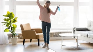 woman cleaning apartment.width