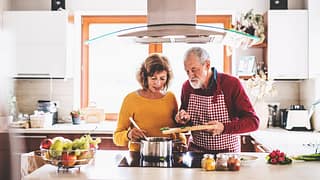Older couple cooking at home qHBEUW.width .jpg
