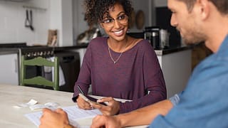 couple at home with bills.width .jpg