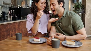 couple eating cheesecake zREeJV.width .jpg