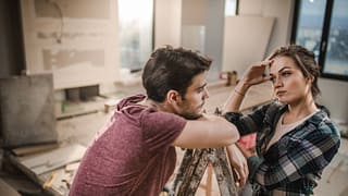 couple stressed doing home renovations.width .jpg