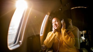 first class plane passenger RCGj.width .jpg