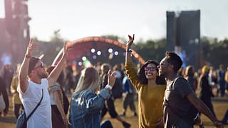 friends dancing at music festival sNvM.width .jpg