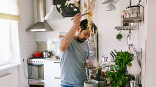 man cooking pasta at home.width .jpg