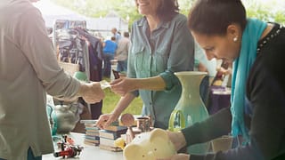 people shopping at yard sale AxtmIUd.width .jpg
