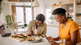 two people in kitchen oWgTzUh.width .jpg