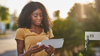 woman at mailbox.width .jpg