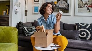 woman unpacking delivery oQULHp.width .jpg