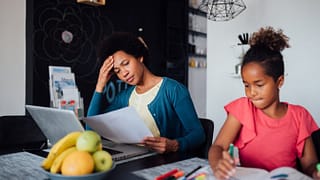 worried mom with daughter doing homework pvfm.width .jpg