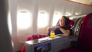 Airplane passenger flying business class cwqh.width .jpg