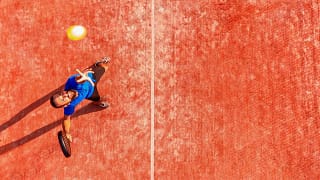C man about to serve tennis ball ncysl.width .jpg