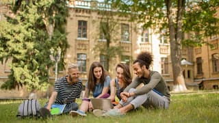 College students studying on grass KaLEug.width .jpg