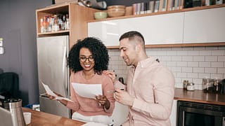 Couple looking over paperwork together in the.width YOgSVXc.jpg