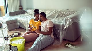 Couple taking a break from painting living ro.width VaYFp.jpg