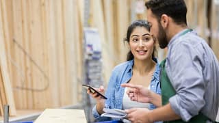 Home improvement store worker helping custome.width .jpg