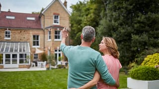 Older couple look at a home cQcWIq.width .jpg