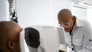 Person getting their eyes scanned by tech. ji.width .jpg