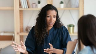 Professional woman having a sit down discussi.width agnUSL.jpg