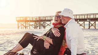 Senior couple embracing on the beach. QTxQl.width .jpg