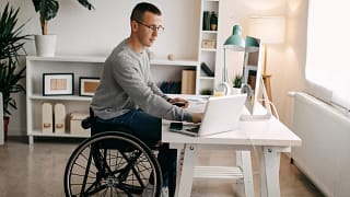 a person at a laptop gettyimages .jpg