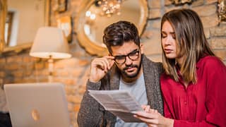 couple looking at bills .jpg