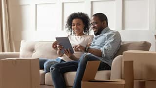 couple with moving boxes.width .jpg