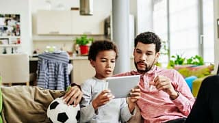 dad and son with tablet Faodsbc.width .jpg