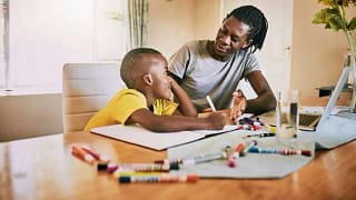 dad helping sone with homework LmqIRde.width .jpg