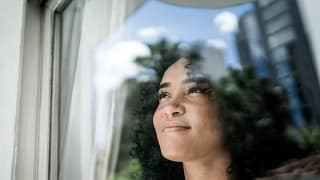 getty grateful thankful thinking smiling looking up.jpg