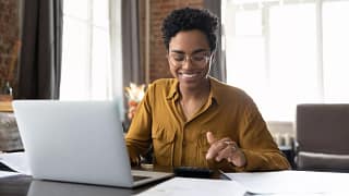 investor smiling computer.jpg