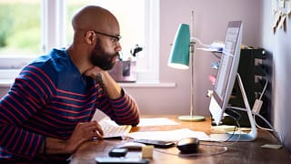 person staring at computer screen.jpg