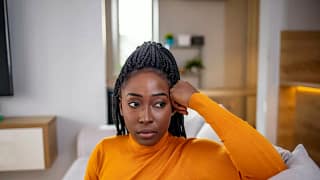 person looking stressed on couch JHTgI.width .jpg