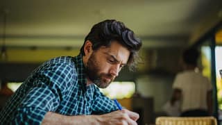 person writing letter wLKZjKy.width .jpg