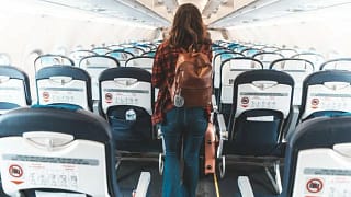 woman boarding airplane hOQp.width .jpg