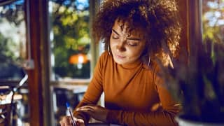 woman writing in notebook BQggFYa.width .jpg