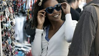 Woman shopping for sunglasses RSnHkOr.width .jpg