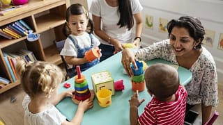 kids and teacher in daycare.width .jpg