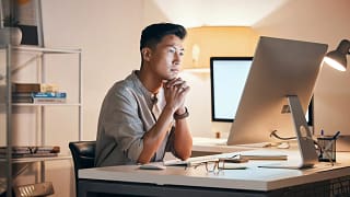 man s serious comp monitor gettyimages .jpg